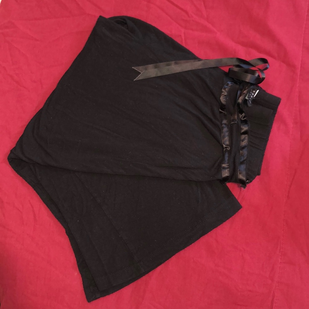 These black Carole Little pants are a size XL.
